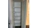 Functional pantry with wire shelving for food storage at 333 Lake Howard Nw Dr # 202C, Winter Haven, FL 33880