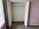 Spacious walk-in closet with double doors and shelving at 333 Lake Howard Nw Dr # 202C, Winter Haven, FL 33880