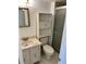 Clean bathroom with vanity, toilet, and shower at 333 Lake Howard Nw Dr # 202C, Winter Haven, FL 33880