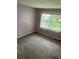 Spacious bedroom with neutral walls and carpeting at 333 Lake Howard Nw Dr # 202C, Winter Haven, FL 33880