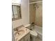 Clean bathroom with a bathtub, shower, and updated vanity at 333 Lake Howard Nw Dr # 202C, Winter Haven, FL 33880