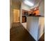 Fully equipped kitchen with modern appliances and breakfast bar at 8101 Resort Village Dr # 3303, Orlando, FL 32821