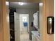 Convenient laundry room with washer, dryer, and storage at 815 E Church St, Bartow, FL 33830