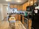 Well-equipped kitchen featuring ample cabinetry and modern appliances at 815 E Church St, Bartow, FL 33830