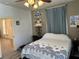 Cozy bedroom with a queen-size bed and decorative accents at 815 E Church St, Bartow, FL 33830