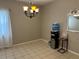 Formal dining area with chandelier and water dispenser at 815 E Church St, Bartow, FL 33830
