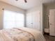Spacious bedroom with a queen bed and ample closet space at 4814 Rockvale Dr, Kissimmee, FL 34758