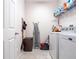 Laundry room with washer, dryer and shelving at 4814 Rockvale Dr, Kissimmee, FL 34758