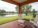 Relaxing screened porch overlooking a lake at 4814 Rockvale Dr, Kissimmee, FL 34758