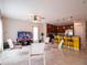 Spacious living area with open concept to kitchen at 4814 Rockvale Dr, Kissimmee, FL 34758