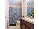 Bathroom with double sinks and a shower/tub combo at 4814 Rockvale Dr, Kissimmee, FL 34758