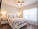Bright bedroom with a queen-size bed and string lights at 4814 Rockvale Dr, Kissimmee, FL 34758