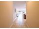 Bright hallway with view into the kitchen and dining area at 4814 Rockvale Dr, Kissimmee, FL 34758
