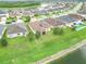 Aerial view of house with solar panels and backyard at 4814 Rockvale Dr, Kissimmee, FL 34758