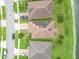 Aerial view of houses on a street by a lake at 4814 Rockvale Dr, Kissimmee, FL 34758