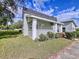 Charming two-story house with a covered porch and well-manicured lawn at 1010 Martin Luther King Jr Blvd, Bartow, FL 33830