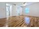 Bright bedroom with wood-look floors and ensuite bathroom access at 1010 Martin Luther King Jr Blvd, Bartow, FL 33830