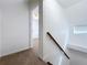 View of upper hall and bedroom with carpet flooring at 1010 Martin Luther King Jr Blvd, Bartow, FL 33830