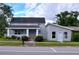 Two-story house with a large front yard and a detached garage at 1010 Martin Luther King Jr Blvd, Bartow, FL 33830