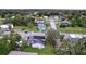 Aerial view of a house and surrounding neighborhood, showcasing the property's location and proximity to other homes at 1010 Martin Luther King Jr Blvd, Bartow, FL 33830