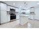 Modern kitchen with stainless steel appliances and white cabinetry at 1010 Martin Luther King Jr Blvd, Bartow, FL 33830