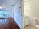 Small half bathroom with a pedestal sink and toilet at 1010 Martin Luther King Jr Blvd, Bartow, FL 33830
