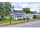 House with additional building, nicely landscaped, and ample parking at 1010 Martin Luther King Jr Blvd, Bartow, FL 33830
