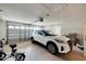 Garage with space for one car, a scooter and some storage at 2178 Sunstone Dr, Lakeland, FL 33813