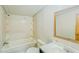 Clean bathroom with a tub, toilet, and vanity at 408 Garrett Ridge Ct, Winter Haven, FL 33880