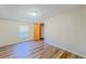 Bright bedroom with wood-look flooring and spacious closet at 408 Garrett Ridge Ct, Winter Haven, FL 33880