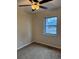 Cozy bedroom with carpeted flooring and a ceiling fan at 503 Se 3Rd St, Mulberry, FL 33860