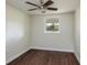 Simple bedroom with hardwood floors and a window at 505 N Polk Ave, Fort Meade, FL 33841