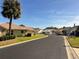 Residential street showcasing the neighborhood's homes and landscaping at 554 Harbourview Dr, Haines City, FL 33844