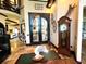 Grand entryway with double doors, high ceilings, and unique decor at 2230 Lake Ariana Blvd, Auburndale, FL 33823