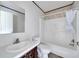 Simple bathroom with a single sink and shower/tub combo at 10109 Old Spanish Trl, Polk City, FL 33868