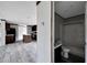 Clean bathroom with a tub shower combination and dark brown vanity at 10109 Old Spanish Trl, Polk City, FL 33868