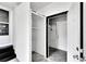 Clean laundry room with built-in shelving and a door to outside at 905 14Th Ne St, Winter Haven, FL 33881