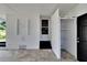 Covered side porch with storage and access to garage at 905 14Th Ne St, Winter Haven, FL 33881