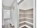 Functional corner pantry offers ample storage shelves at 905 14Th Ne St, Winter Haven, FL 33881