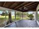 Covered porch with view of backyard at 905 14Th Ne St, Winter Haven, FL 33881