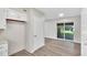 Eat-in kitchen with sliding glass doors leading to a patio at 905 14Th Ne St, Winter Haven, FL 33881