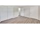 Spacious bedroom with double closets and wood-look floors at 905 14Th Ne St, Winter Haven, FL 33881