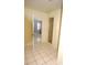 Clean bathroom with a shower and access to bedroom at 2418 Berkshire Dr, Winter Haven, FL 33884