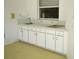 Outdoor kitchen with sink and ample counter space at 2418 Berkshire Dr, Winter Haven, FL 33884