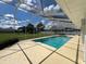 Inviting pool and spa with screened enclosure at 2418 Berkshire Dr, Winter Haven, FL 33884