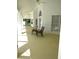Spacious covered patio with seating area at 2418 Berkshire Dr, Winter Haven, FL 33884