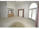 Living room with built-in shelving and wet bar at 2418 Berkshire Dr, Winter Haven, FL 33884