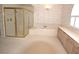 Spacious bathroom with soaking tub and shower at 2418 Berkshire Dr, Winter Haven, FL 33884