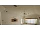Large living room with vaulted ceiling and ceiling fan at 2418 Berkshire Dr, Winter Haven, FL 33884