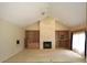 Living room with built-in shelving and stone fireplace at 2418 Berkshire Dr, Winter Haven, FL 33884